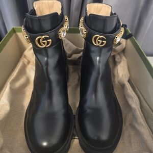 Gucci Black Leather Ankle Boots with Gold Accents